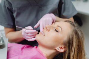 A Lady Getting a Root Canal Procedure — Dentist in Palm Beach, QLD